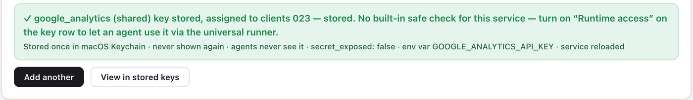 Outloop confirmation that the Google Analytics GA4 credential was stored locally, with View in stored keys highlighted.